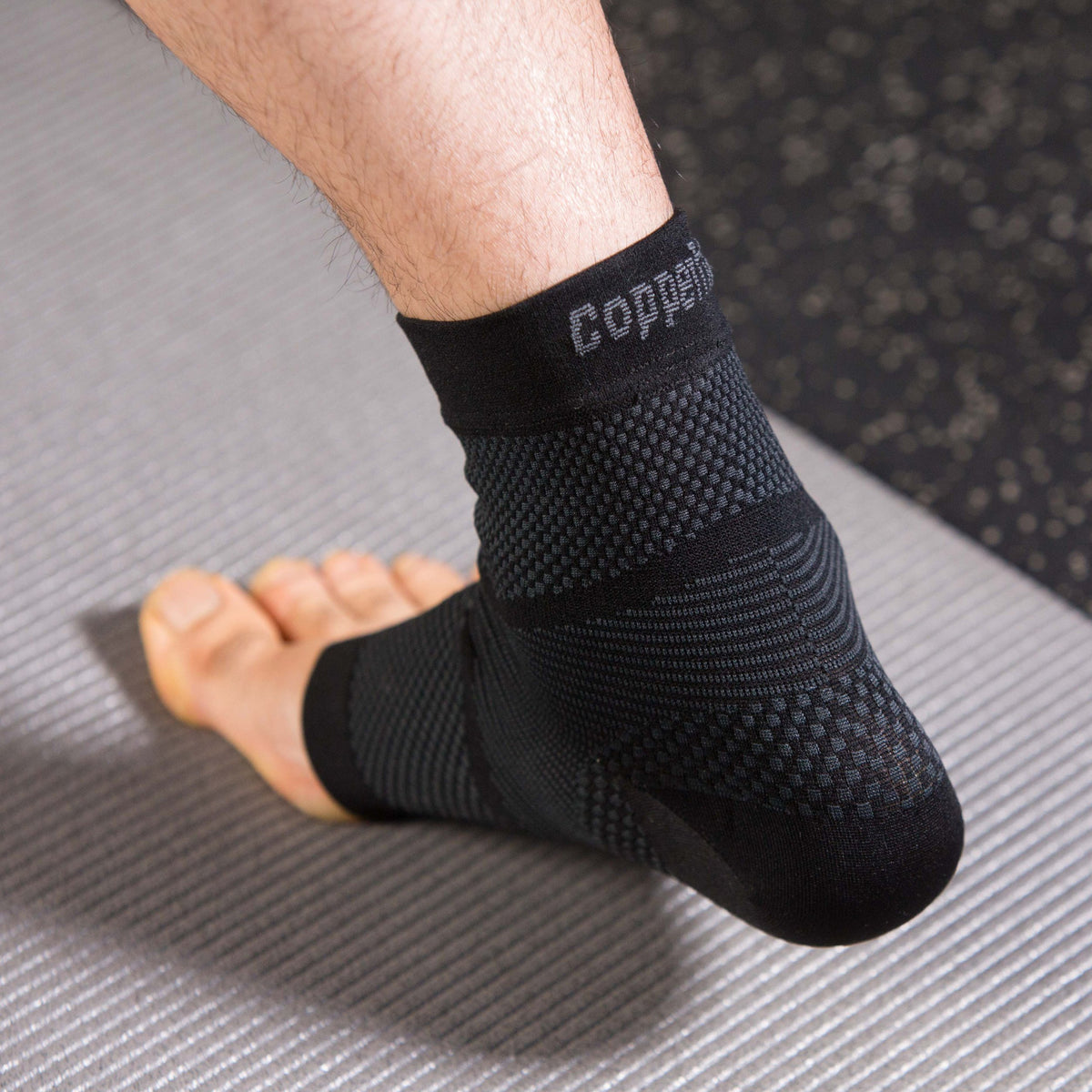 Compression sleeve around ankle for support and all-day comfort.