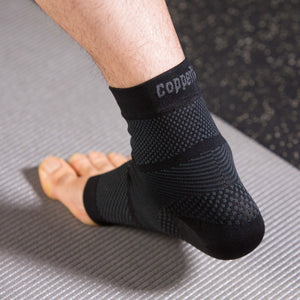 Compression sleeve around ankle for support and all-day comfort.