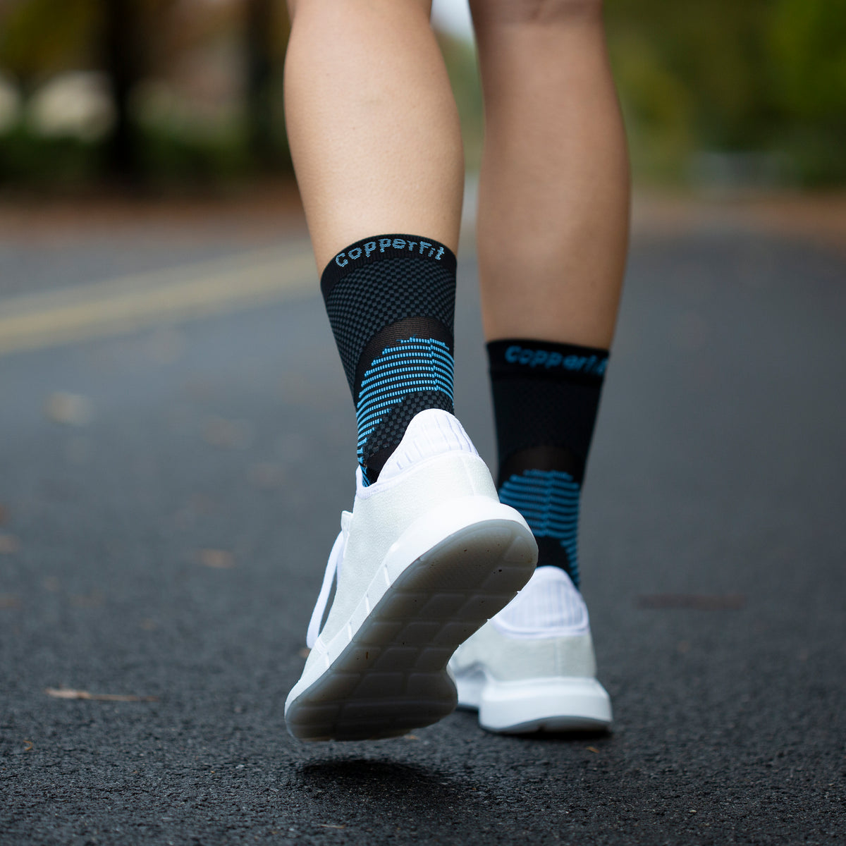 Menthol Infused compression sleeve around ankle for support and all-day comfort.