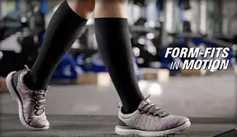 Close up shot of a person walking in the gym wearing sneakers and their socks