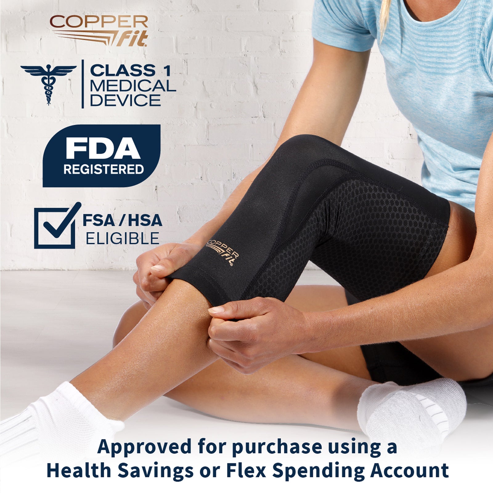 A person wearing a black knee compression sleeve with a honeycomb pattern on the side. product